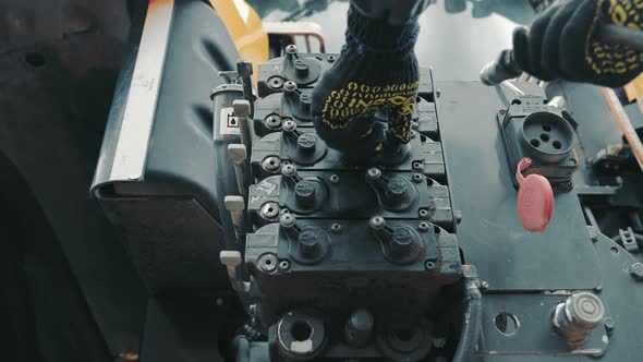 An Employee of the Agricultural Company Connects Bought Power Supply of Large Equipment alt