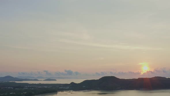 Aerial View Sunrise Above The Mountain Range At Panwa Sea Phuket. alt