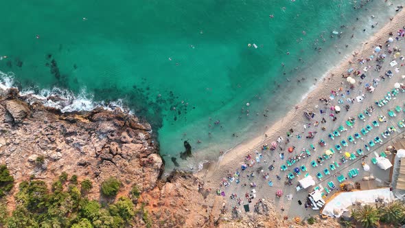 People swim in the azure sea aerial view 4 K Turkey Alanya alt