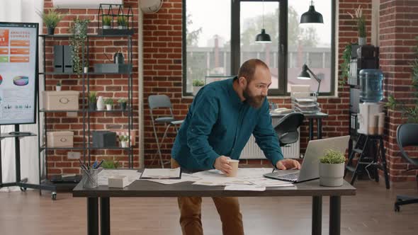 Business Man Celebrating Good News About Startup Deal alt