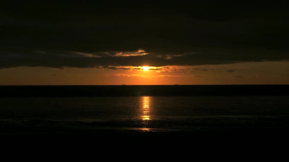 Sunset Time lapse Over Sea Horizon