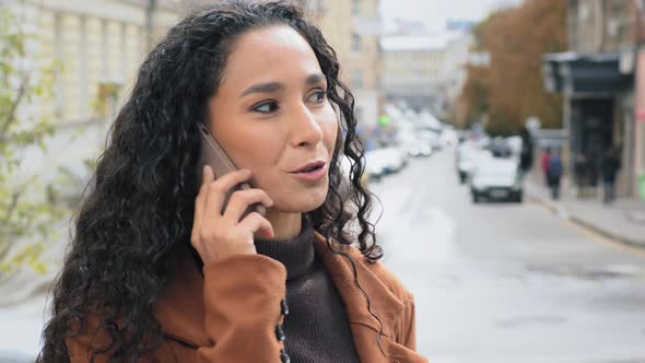 Closeup Woman Talking Cell Mobile Phone in City alt