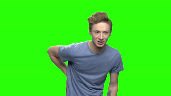 Young Teenage Boy with Back Pain alt