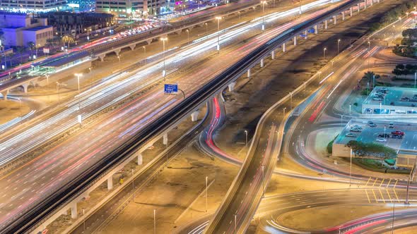 Sheikh Zayed Road Traffic in Dubai Marina and Jumeirah Lakes Towers Districts Night Timelapse alt