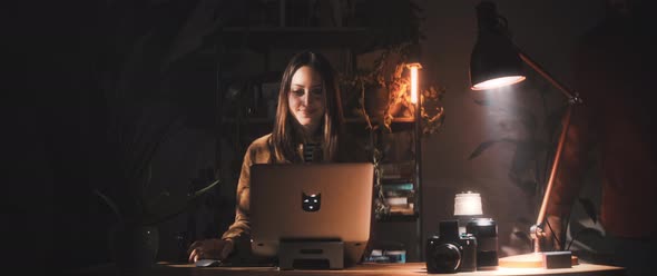 Man and Woman work together at desk alt