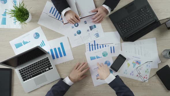 Proactive Sales Manager Making Good Offer to Client, Fingers Walking on Table alt