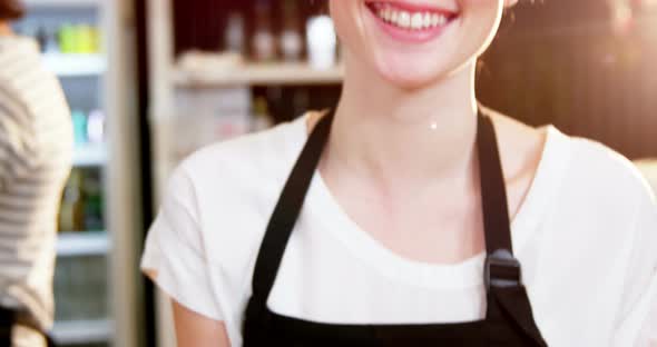 Waitress holding a tray of cake alt
