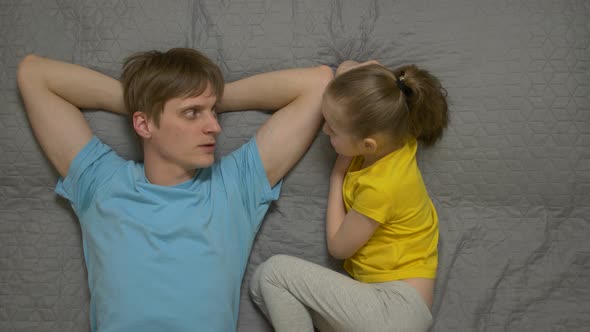 Father And Daughter Are Talking