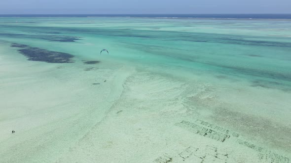 Kitesurfing Near the Shore of Zanzibar Tanzania alt