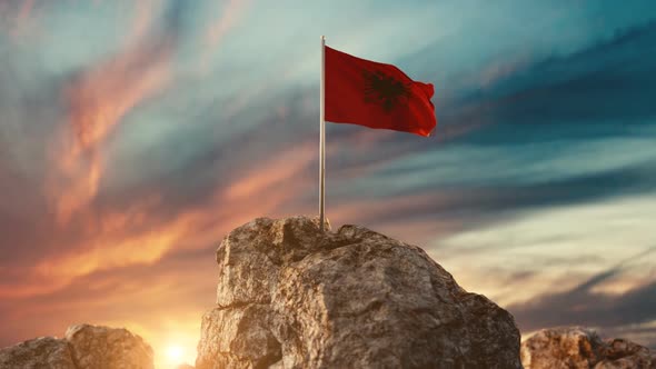 Waving Albanian Flag On Rocky Landscape