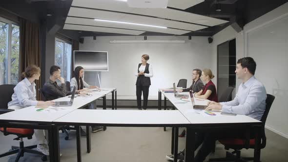 CEO Meeting with Employees in Office Talking Analyzing Business Strategy alt