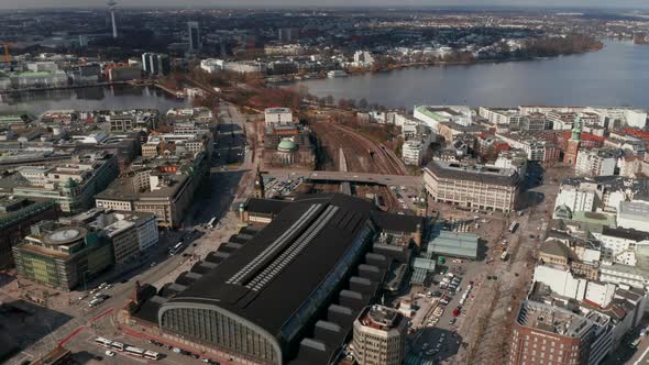 Aerial View of Multiple Train Tracks and Train Arriving at Hamburg Main Train Station By