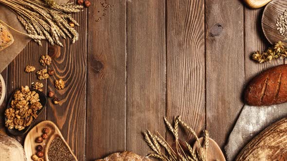 Rye, Wheat and Multigrain Rustic Bread Loaves Over Dark Wooden alt