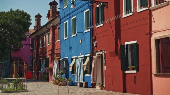 Real Time Shot of a Street with Colorful Houses on the Island of Burano in Italy. Burano Island Is