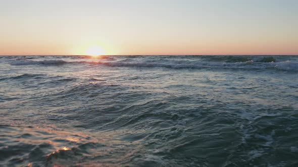 Ocean Waves in Sunrise