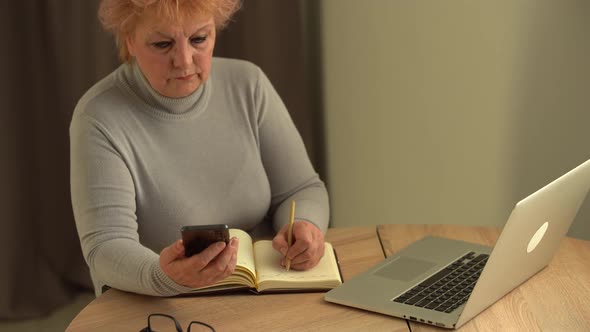 Close Up Wrinkled Male Hands Writing Information alt
