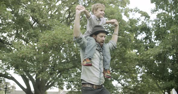 Father and son playing outside