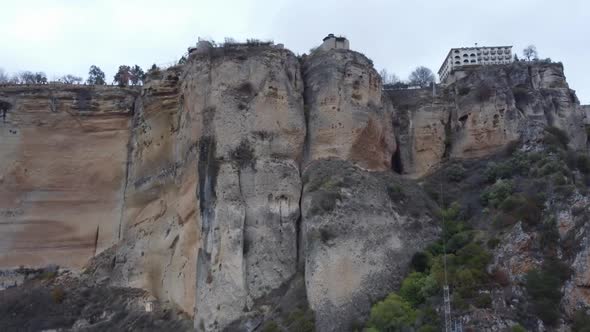 Impressive tall vertical limestone cliffs below Spanish town, Ronda alt
