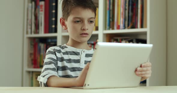 Boy Using Digital Tablet