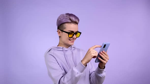 Young Woman Surprising to Find Funny Memo Laughing Using Smartphone alt