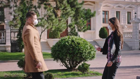 A Couple Meeting in the Middle of the Street They alt