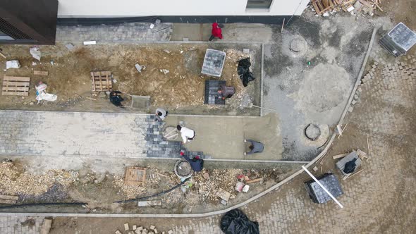 Aerial View Builders Paving and Creating Landscaping on Construction Sites alt