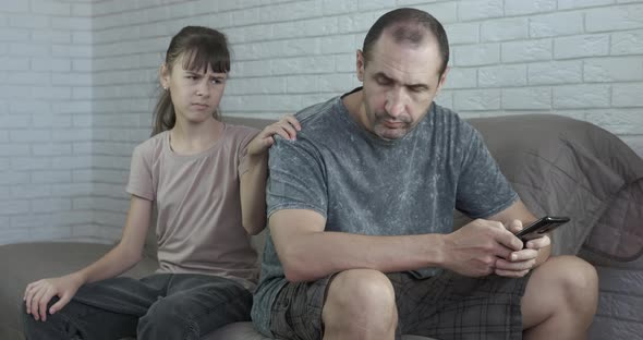 Busy Father with Telephone alt