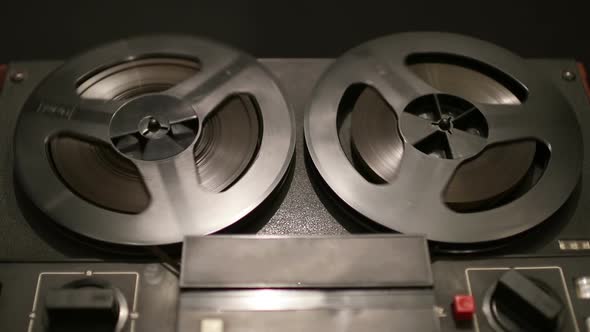 Old Coil Tape Recorder with Magnetic Tape on Reels alt