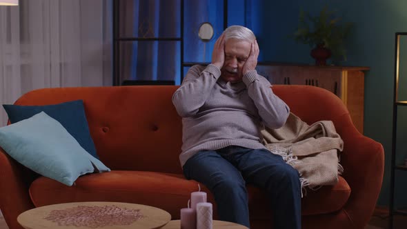 Scared Tired Senior Man Wakes Up From Bad Nightmare in Bedroom at Home Stress Nervousness Anxiety alt