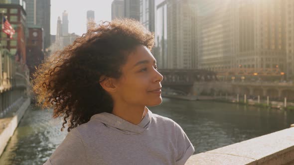 Portrait of an African American woman getting ready to workout in Chicago alt