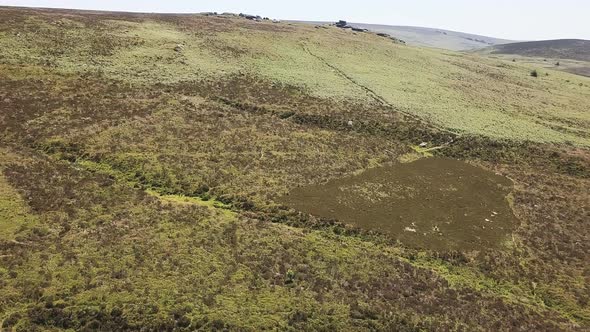 Aerial view of tors and landscapes in Dartmoor National Park England. alt
