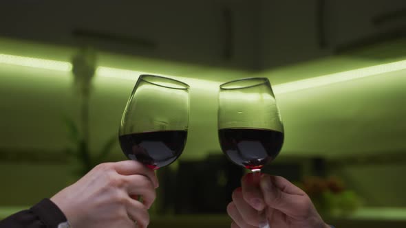 Toasting with red wine alt
