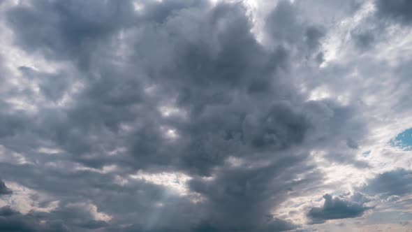 Timelapse of Gray Cumulus Clouds Moves in Blue Dramatic Sky Cirrus Cloud Space alt