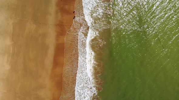 Tropical Beach Footage with Aerial Bird Eye View of Green Foaming Ocean Waves