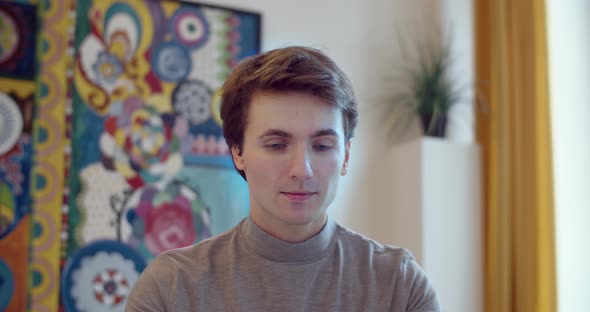 Front View Freelancer Relaxing After Work Computer Indoors Slow Motion alt