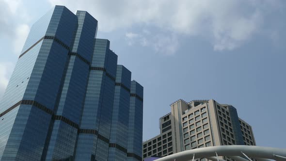 Time lapse from Skyscrapers next to the skywalk at Sathon District in Bangkok alt