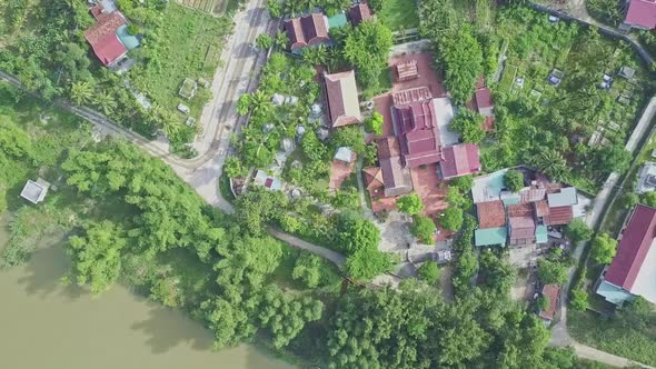 Aerial View Temple Complex Among Park Near River in Vietnam alt