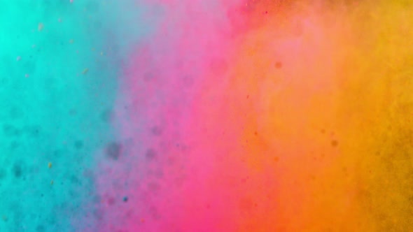 Color Powder Background in SUper Slow Motion Isolated on Black Background. alt