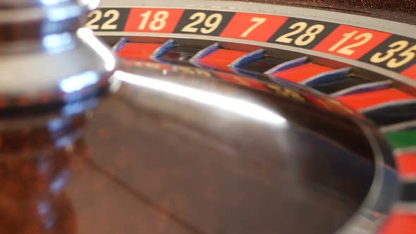 Ball on Roulette Table in Casino