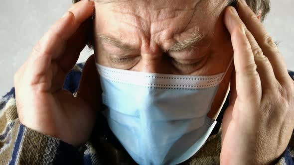 Sick Man in Medical Mask Is Suffocating, Breathing Heavily, He Does Not Have Enough Oxygen alt