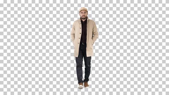 Confident handsome young man wearing coat walking, Alpha Channel alt
