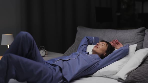 Happy Woman Going to Sleep alt