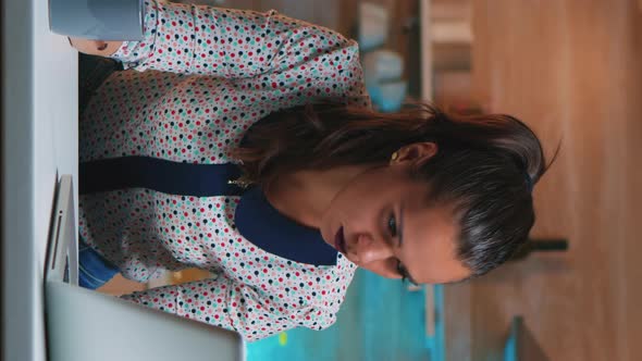 Vertical Video Exhausted Freelancer Sleeping in Front of Laptop alt