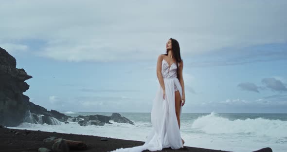 Very Attractive Woman in a White Romantic Dress alt