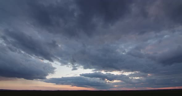 Gloomy Clouds At Sunset, Stormy. Timelapse alt