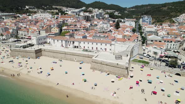 Forte de Santiago de Sesimbra and Praia da Califórnia beach, Sesimbra, Portugal alt