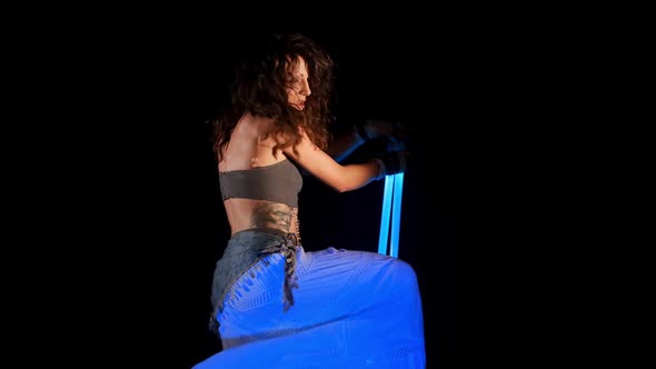 Beautiful Gipsy Woman Dancing In Neon Light With Ultraviolet Staffs 10 alt