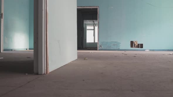 Abandoned Office Room with Holes in the Wall