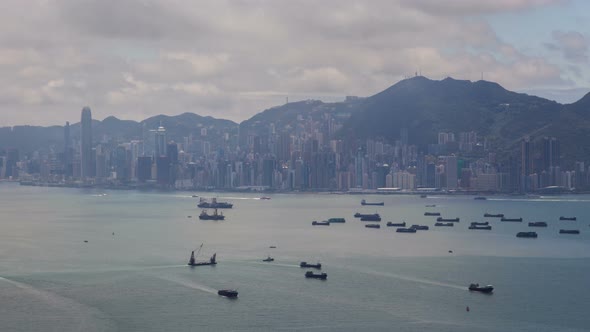 Hong Kong Urban Cityscape Aerial Skyline Panorama Timelapse at Day Pan Up alt