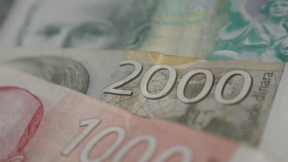 Shallow DOF highest denominations of dinar   4K 2160p 30fps UltraHD panning   footage - Lot of Serbi alt